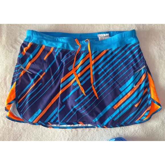 Nike Pants - Nike Dri-FIT Womens Running Skort Blue Orange Geometric Stripe Size Medium